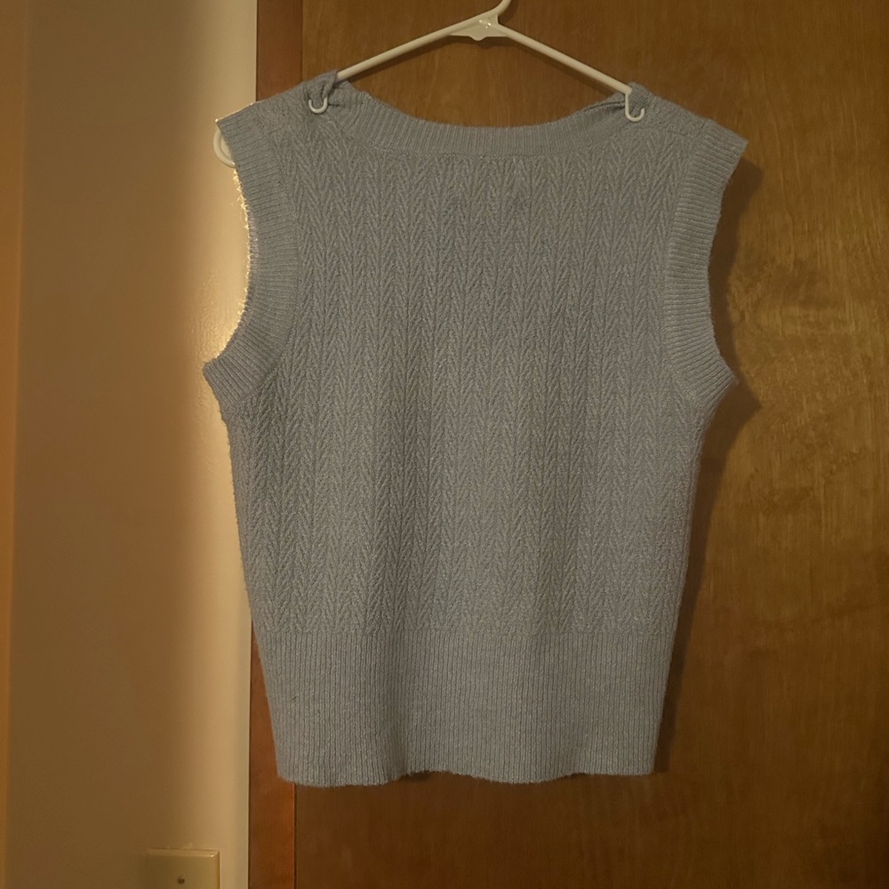 Light blue sweater vest size small